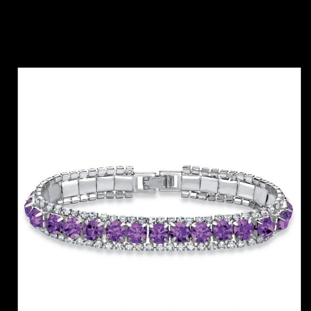 Amethyst and silver tone tennis bracelet